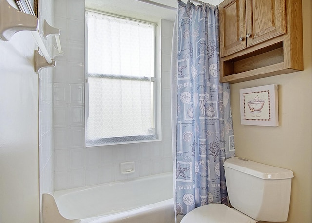 bathroom with toilet and shower / bath combination with curtain