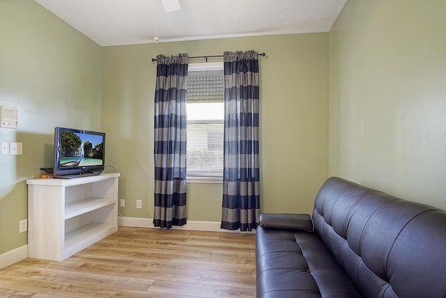 4408 Gator Trace Ln, Fort Pierce, FL 34982 - living room with light wood-type flooring, baseboards, and a ceiling fan