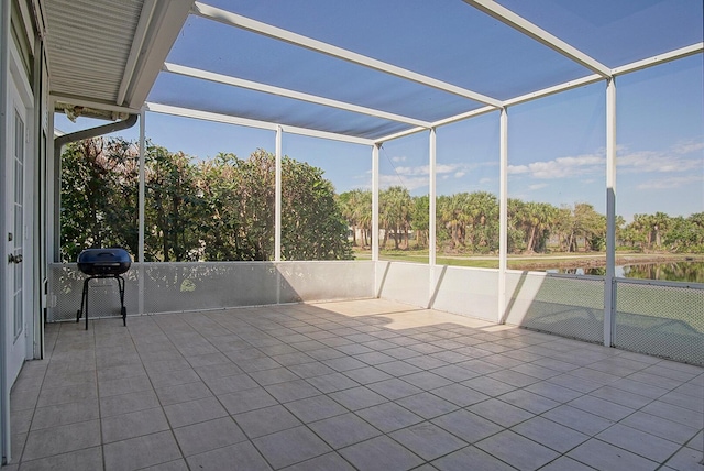 unfurnished sunroom featuring a wealth of natural light