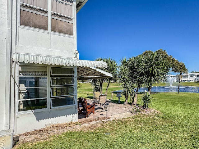 view of yard with a water view