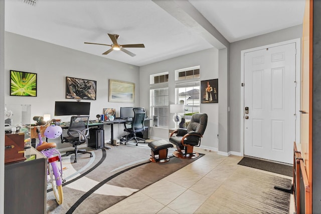 office space featuring tile patterned flooring, baseboards, and a ceiling fan