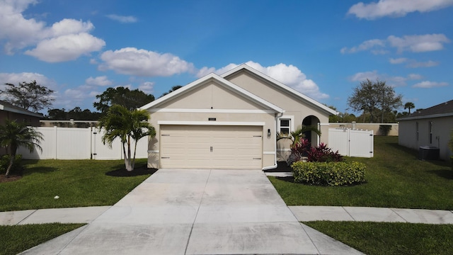 ranch-style home with a garage, a gate, driveway, and stucco siding