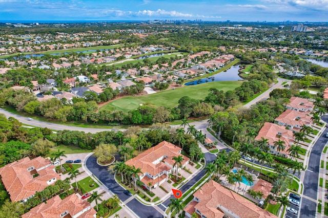 bird's eye view featuring a residential view, a water view, and golf course view