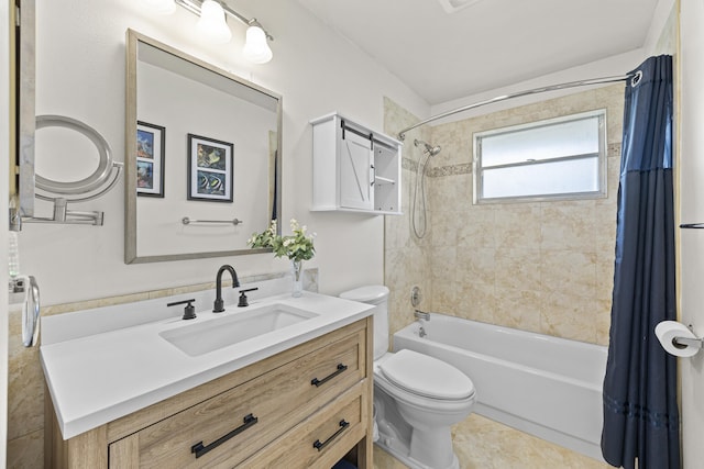 full bathroom featuring shower / bath combination with curtain, tile patterned flooring, vanity, and toilet