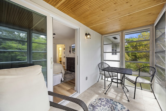 sunroom with wood ceiling