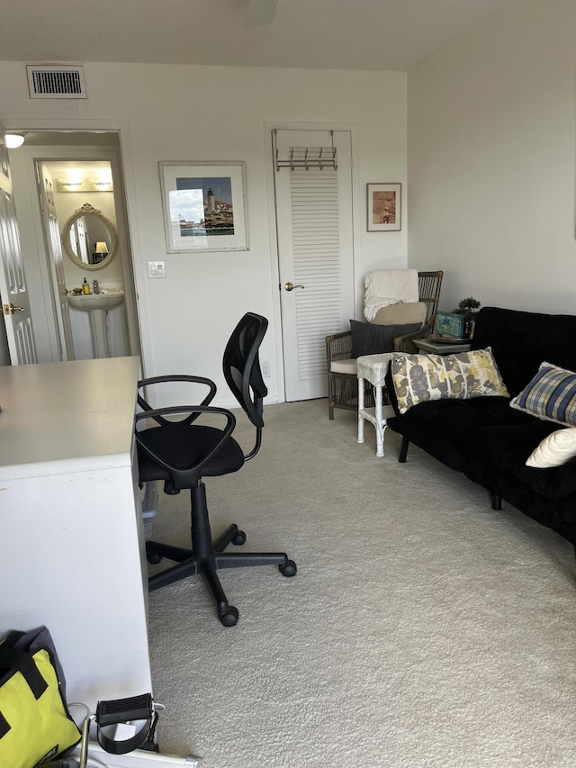 office space with carpet floors and visible vents