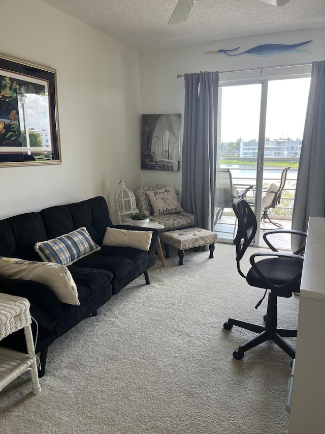 4062 Guildford D, Boca Raton, FL 33434 - carpeted home office featuring a textured ceiling and ceiling fan