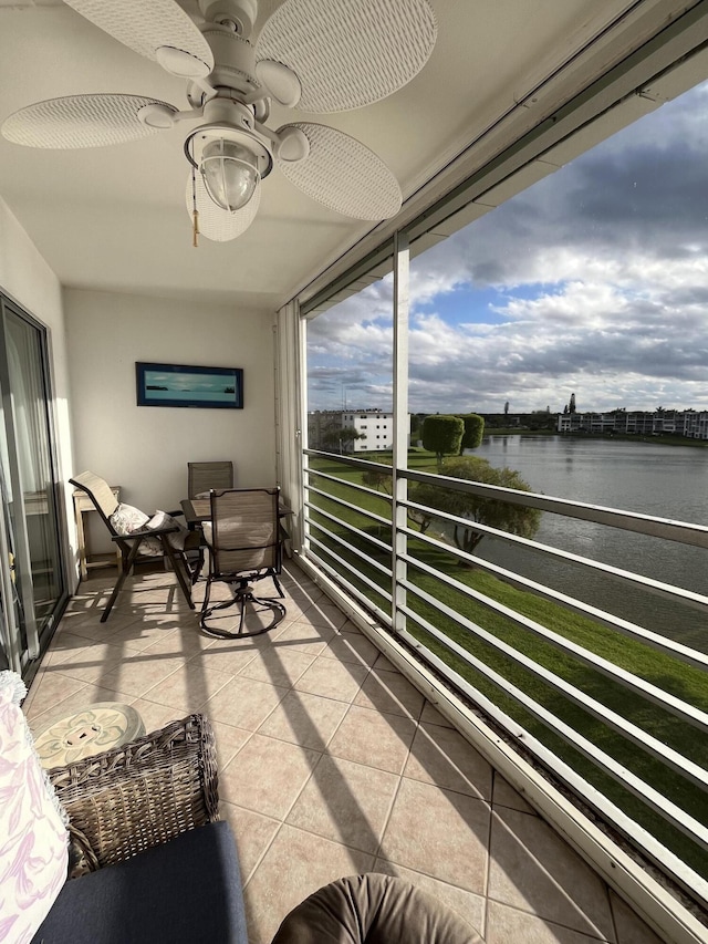 4062 Guildford D, Boca Raton, FL 33434 - sunroom featuring a water view