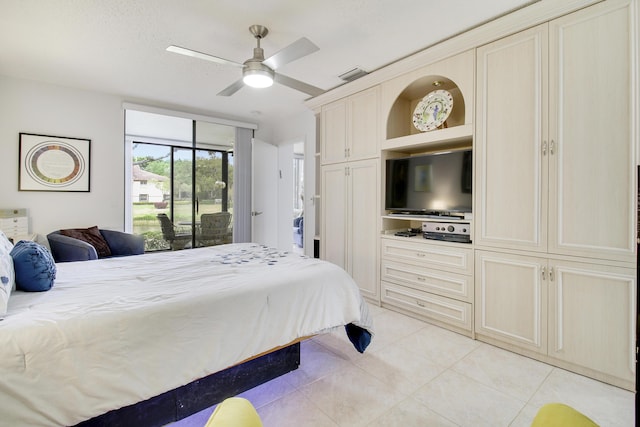 bedroom featuring access to outside, light tile patterned flooring, visible vents, and a ceiling fan