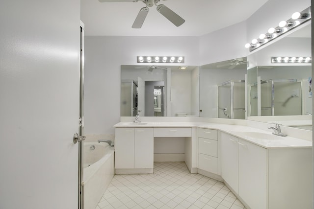 full bath featuring ceiling fan, tile patterned floors, vanity, a shower stall, and a bath