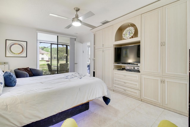 bedroom with a ceiling fan, light tile patterned floors, access to exterior, and visible vents