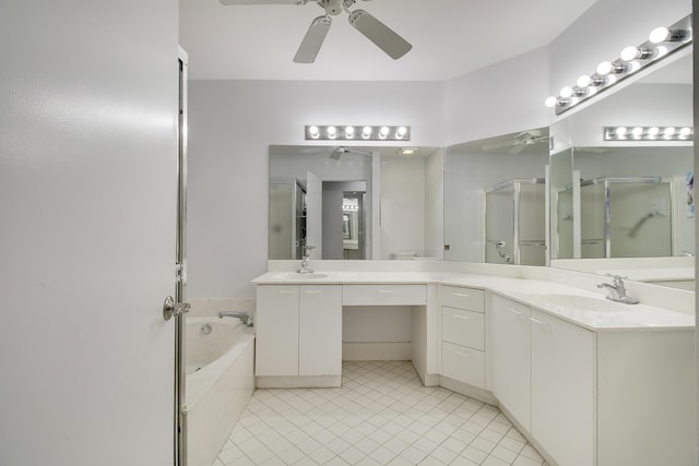 full bathroom with vanity, a stall shower, tile patterned flooring, and a ceiling fan