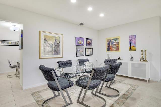 dining space featuring light tile patterned floors, baseboards, visible vents, and recessed lighting