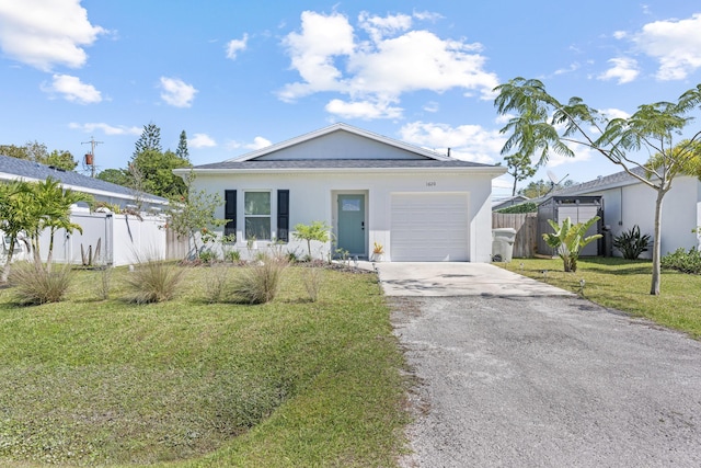 ranch-style house with stucco siding, fence, a garage, driveway, and a front lawn