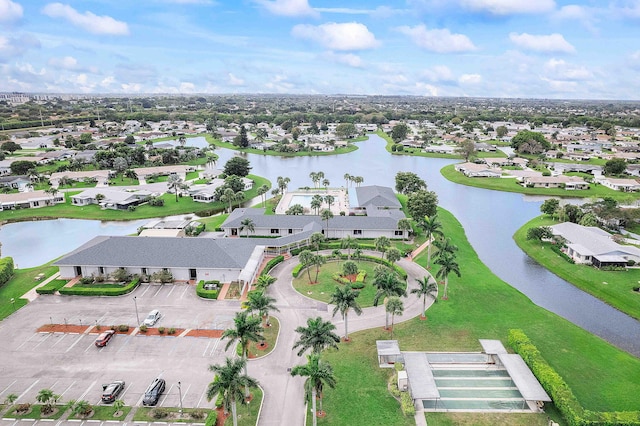 aerial view with a water view and a residential view