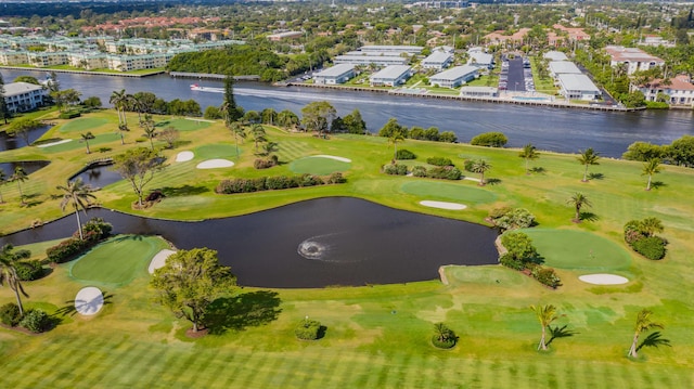 aerial view with view of golf course and a water view