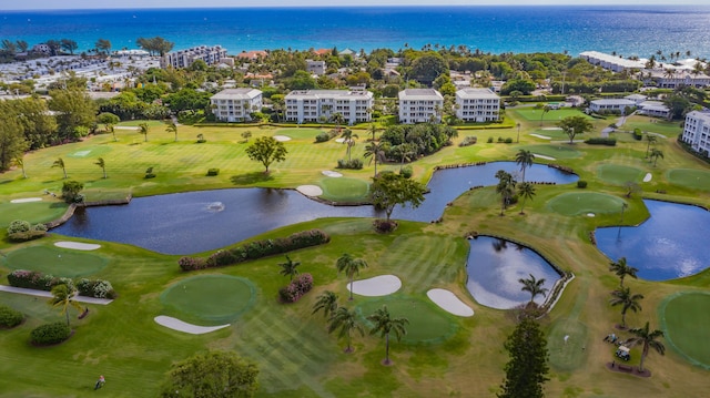 aerial view featuring a water view and golf course view