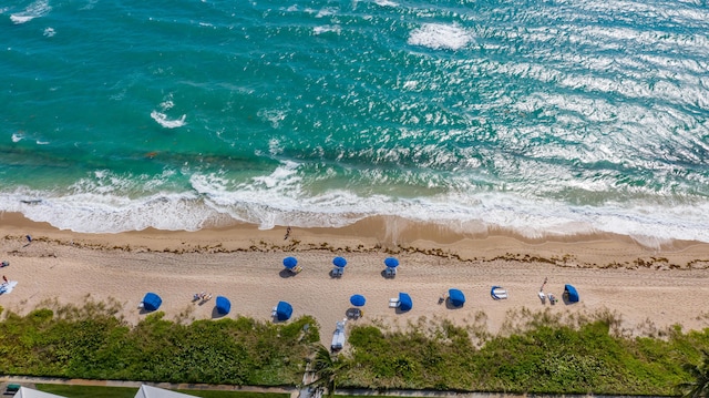 aerial view featuring a water view and a view of the beach