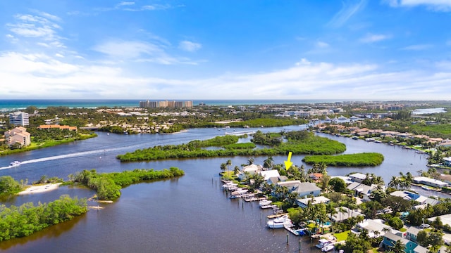 birds eye view of property featuring a water view