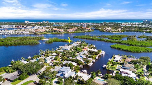 drone / aerial view with a water view