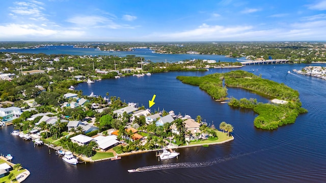 bird's eye view featuring a water view and a residential view