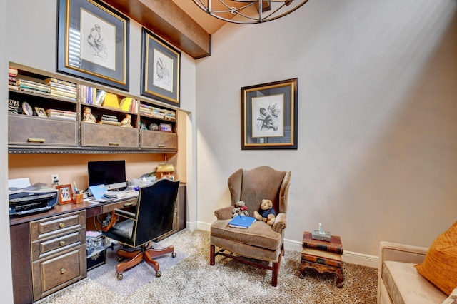 carpeted office featuring baseboards