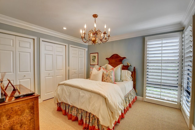 bedroom featuring light carpet, a notable chandelier, crown molding, two closets, and recessed lighting