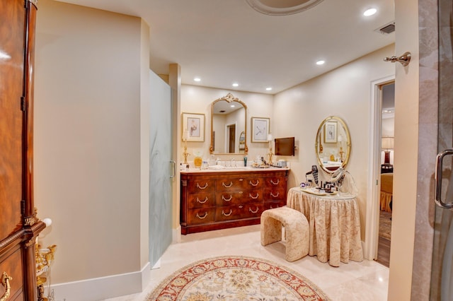 bathroom with recessed lighting, visible vents, connected bathroom, and vanity