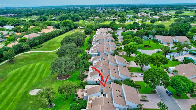 aerial view with view of golf course and a residential view