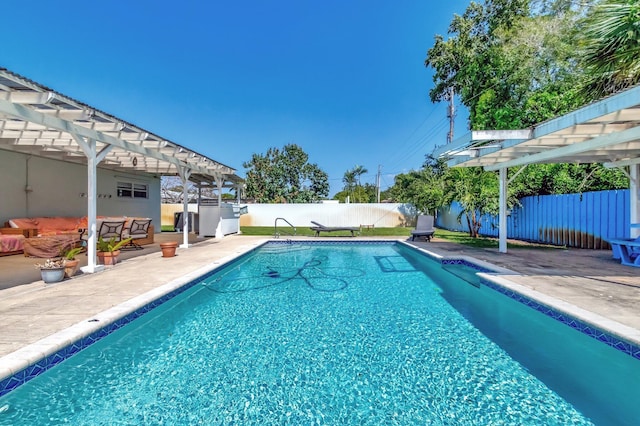 view of pool featuring a patio, a fenced backyard, a fenced in pool, and a pergola