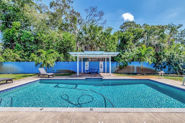 view of pool featuring a fenced in pool, a fenced backyard, and a pergola