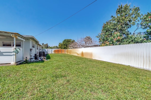 view of yard featuring a fenced backyard