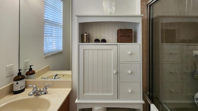 full bathroom featuring vanity and a stall shower