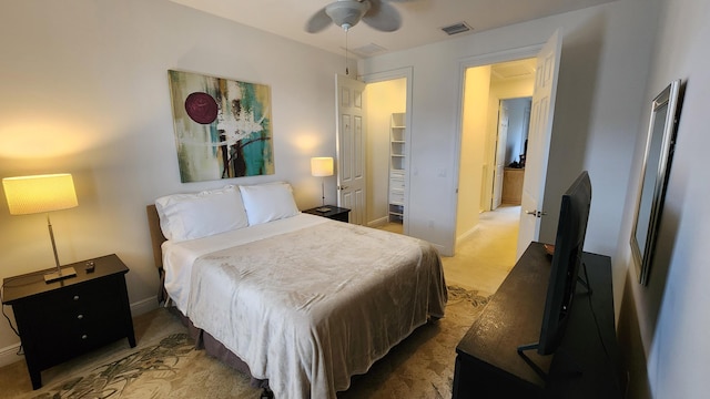 bedroom with visible vents, baseboards, and carpet flooring