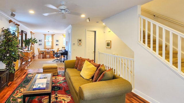 living area with ceiling fan, recessed lighting, wood finished floors, and crown molding