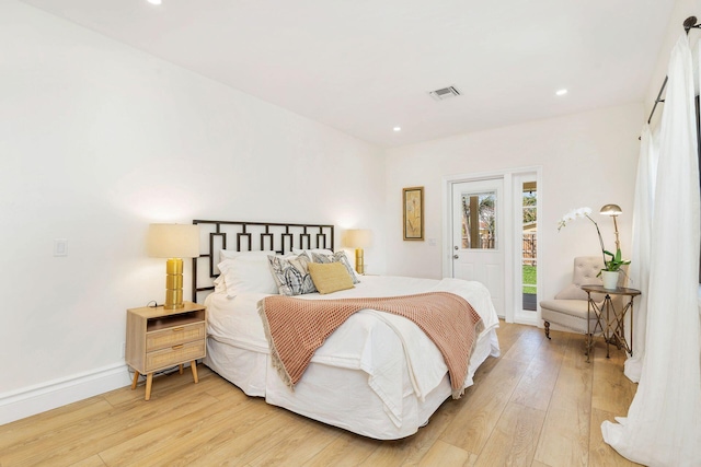 bedroom with recessed lighting, visible vents, baseboards, light wood-style floors, and access to outside