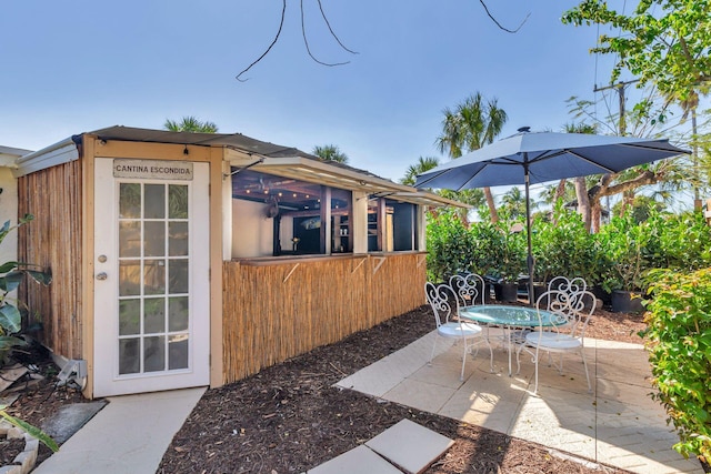 view of patio featuring outdoor dining area