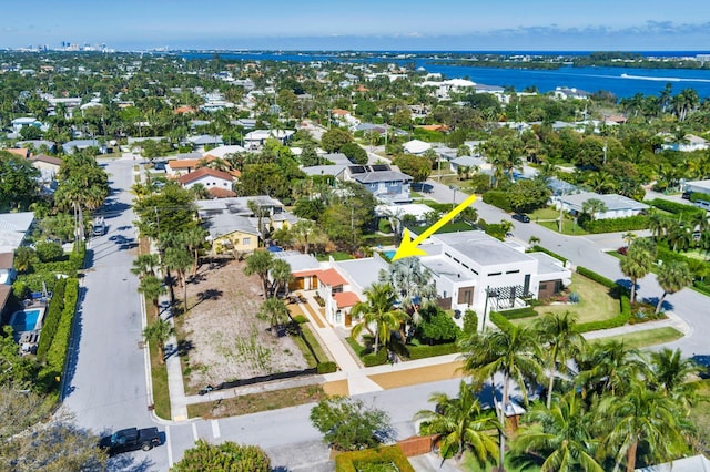 aerial view featuring a residential view and a water view