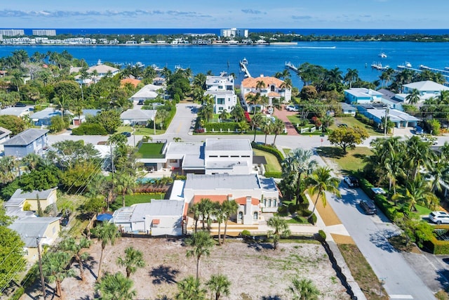 bird's eye view with a water view and a residential view