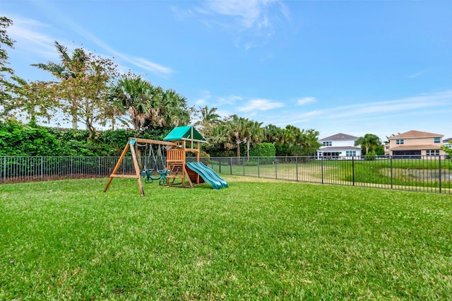 view of play area featuring a yard and a fenced backyard