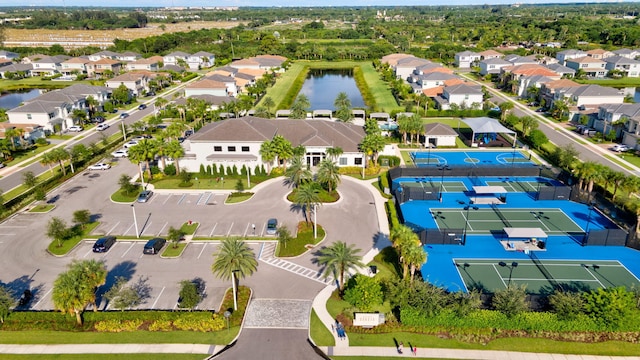 bird's eye view with a water view and a residential view