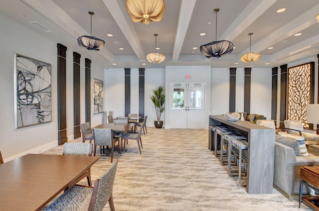 dining room with beam ceiling, recessed lighting, baseboards, and a tray ceiling