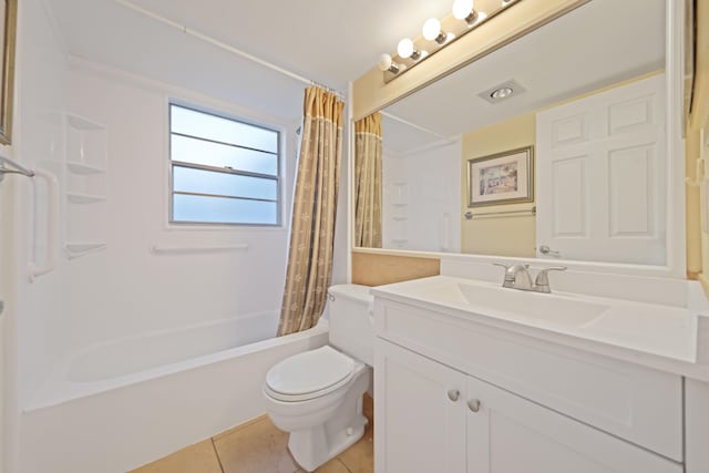 full bath featuring vanity, shower / bath combo with shower curtain, tile patterned flooring, and toilet