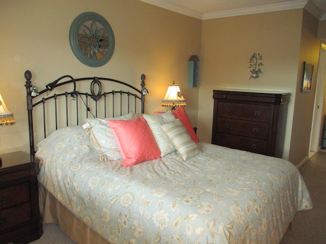 carpeted bedroom featuring ornamental molding and baseboards