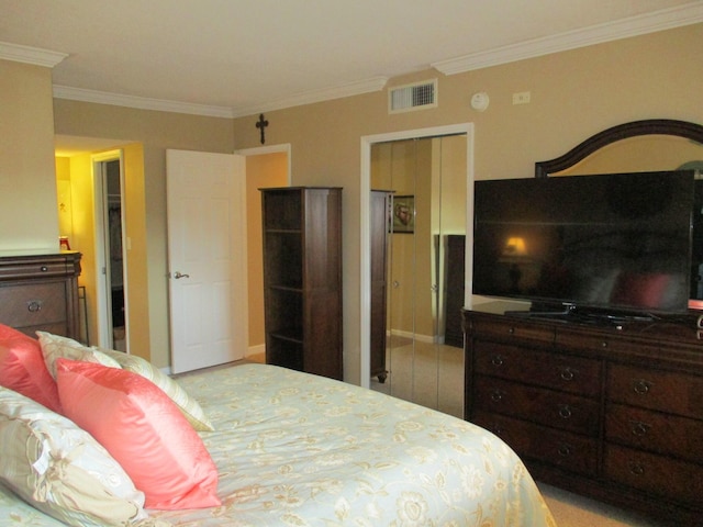 bedroom with visible vents and crown molding