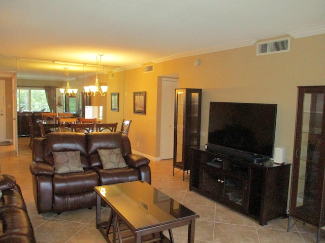 living area featuring light tile patterned flooring, visible vents, crown molding, and an inviting chandelier