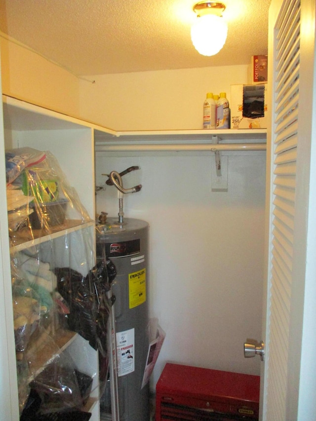 utility room with water heater