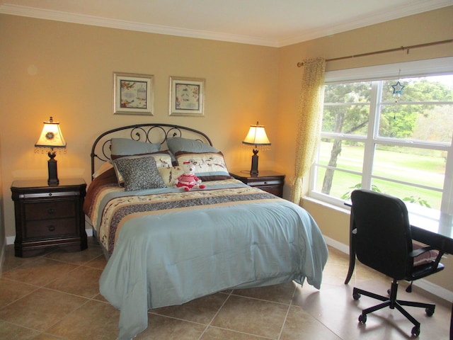 bedroom with tile patterned flooring, crown molding, and baseboards