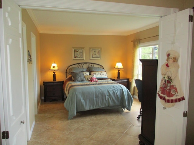 bedroom featuring light tile patterned flooring and crown molding