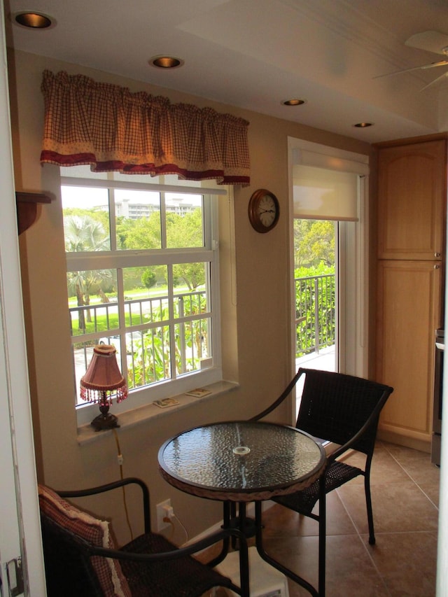 sitting room featuring recessed lighting, a healthy amount of sunlight, and light tile patterned floors